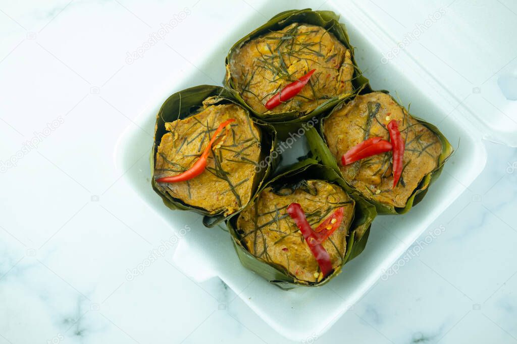 Thai steamed curried fish (Hor Mok Pla) in foam box. Thai traditional food style