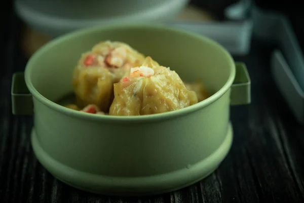 Homemade Chinese steamed shrimp dumpling or Shumai. selective focus