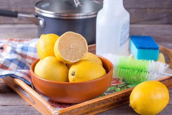 Eco-friendly natural cleaners on a wooden table