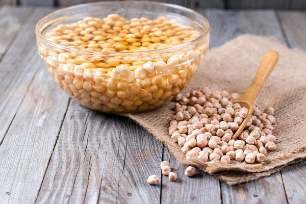 Chickpeas soaked in water in a bowl — Stock Photo, Image