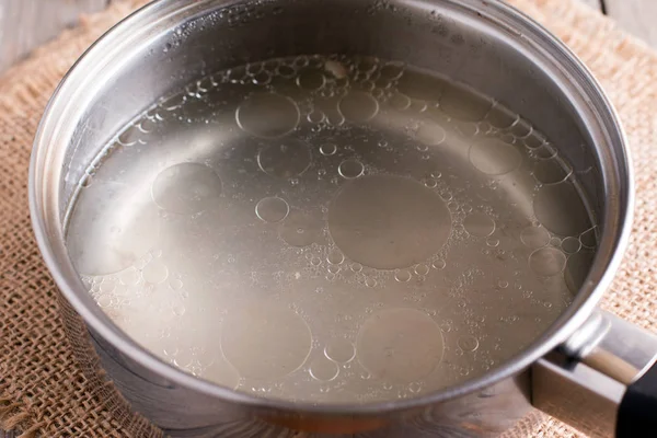 Fresh broth in a saucepan — Stock Photo, Image