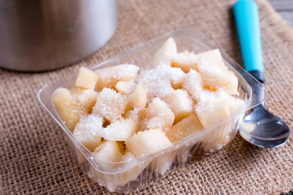 Cubes of pears in a container with sugar. Harvest for the winter — Stock Photo, Image