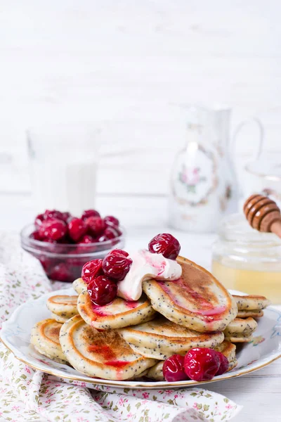 Homemade stack of pancakes with cherries for tasty healthy breakfast — Stock Photo, Image