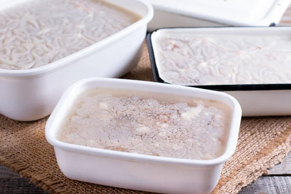 Homemade jelly meat with in the container on the table. Holodets — Stock Photo, Image