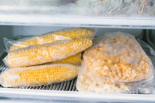 Frozen corn in bag in freezer close up — Stock Photo, Image