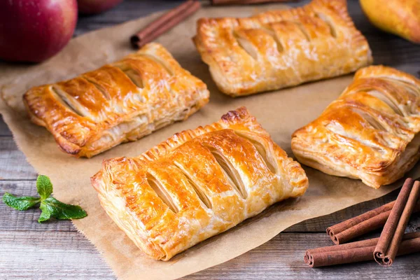 Homemade cakes and puff pastry with apples and caramel — Stock Photo, Image