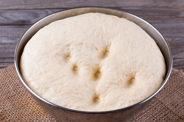 Raw dough in a bread baking dish — Stock Photo, Image