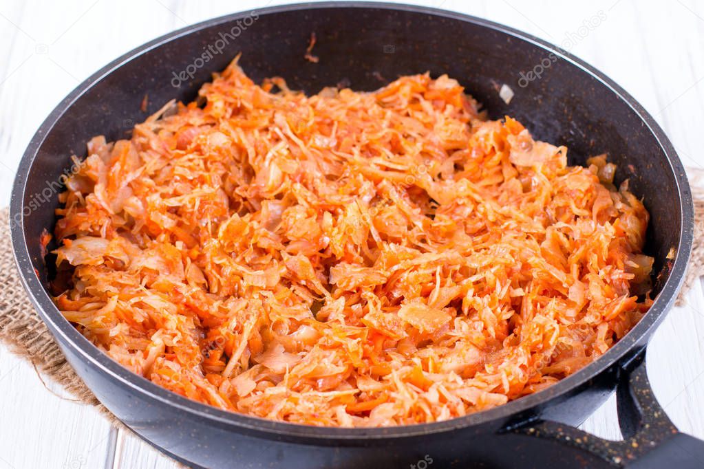 Appetizing fried cabbage in an frying pan