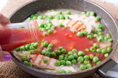 Chicken fillet, onion, peas and tomato sauce clipart