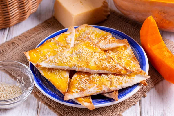 Samosa with pumpkin - traditional oriental pastries.