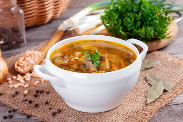 Bowl of pea soup with mushrooms — Stock Photo, Image