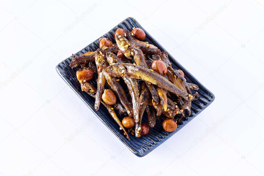 Tazukuri, candied sardines. Dried sardines lightly coated with honey, roasted sesame and peanuts.
