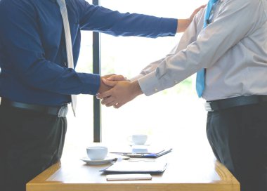 İş adamı tokalaşması, iş başarısı kavramı