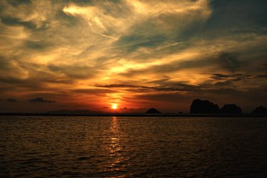 Deniz manzarası, adadan sonra gün batımı