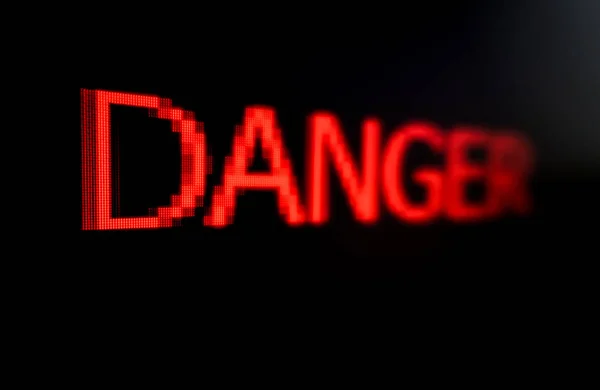 Danger word on black background — Stock Photo, Image