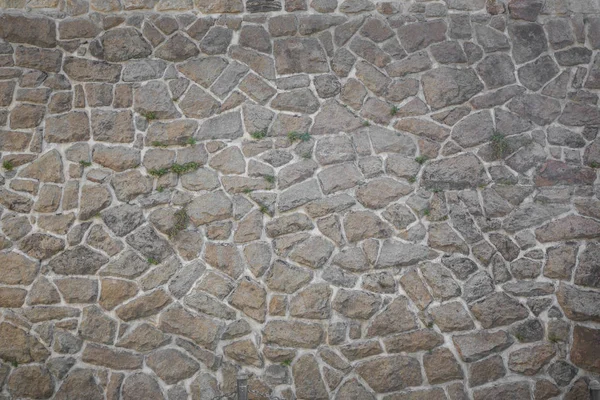 Uma textura de pedras, também adequado como fundo — Fotografia de Stock