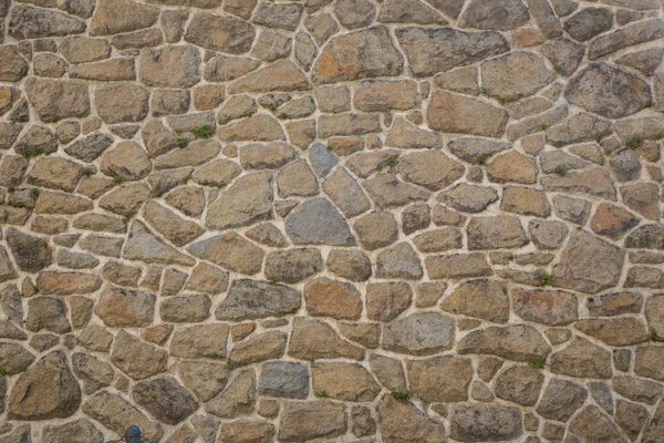Una textura de piedras, también adecuada como fondo —  Fotos de Stock