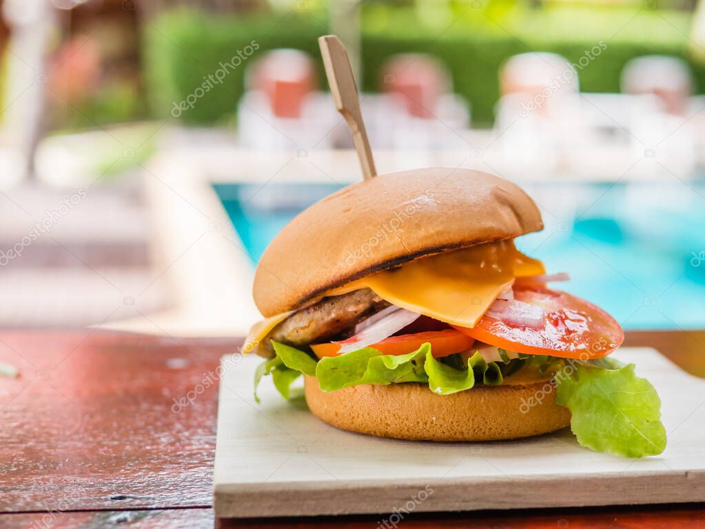 Hamburger with lettuce and cheese