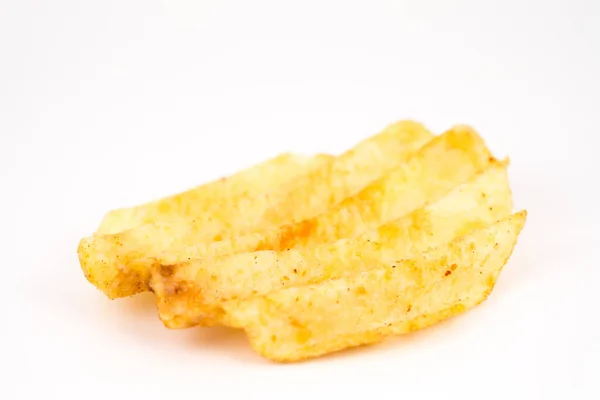 Een aardappel chip op een witte achtergrond en schaduw — Stockfoto