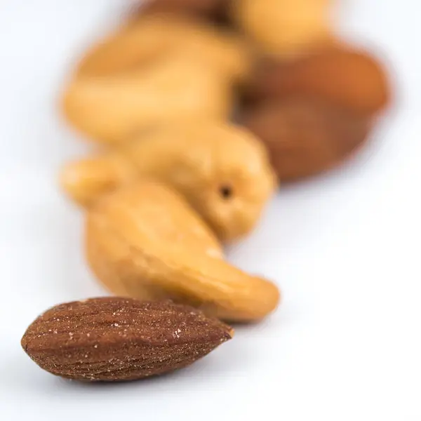 Almonds and cashew nuts — Stock Photo, Image