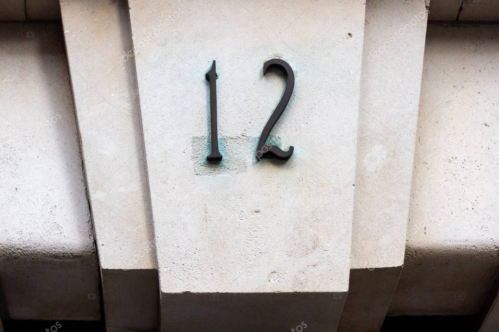 House number 12 on a lintel