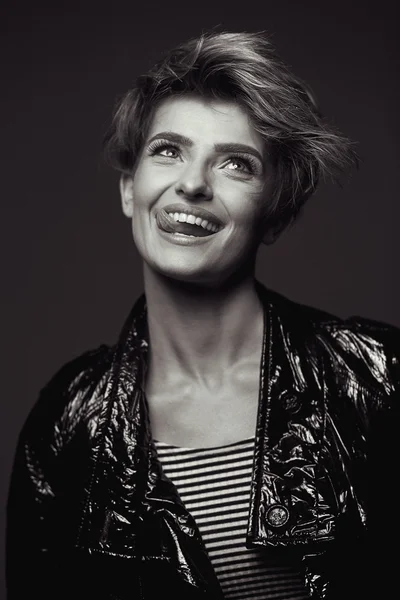 Portrait of pretty smiling woman in studio — Stock Photo, Image