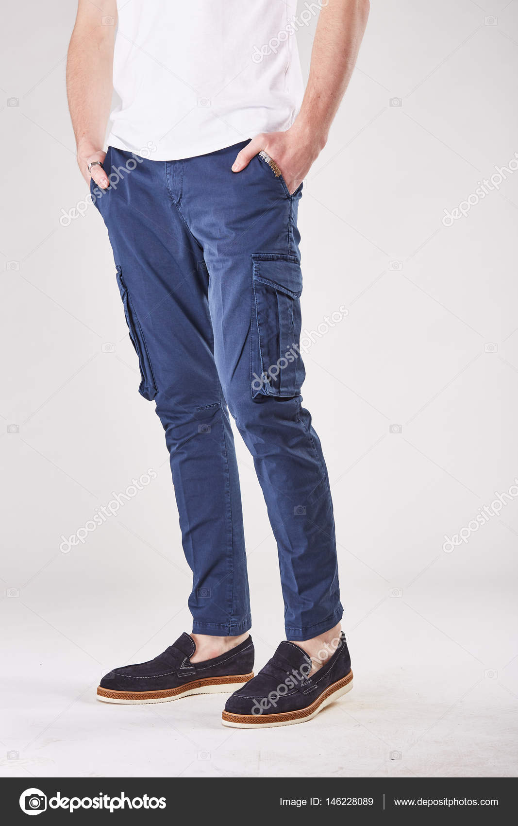 blue pants with black shoes