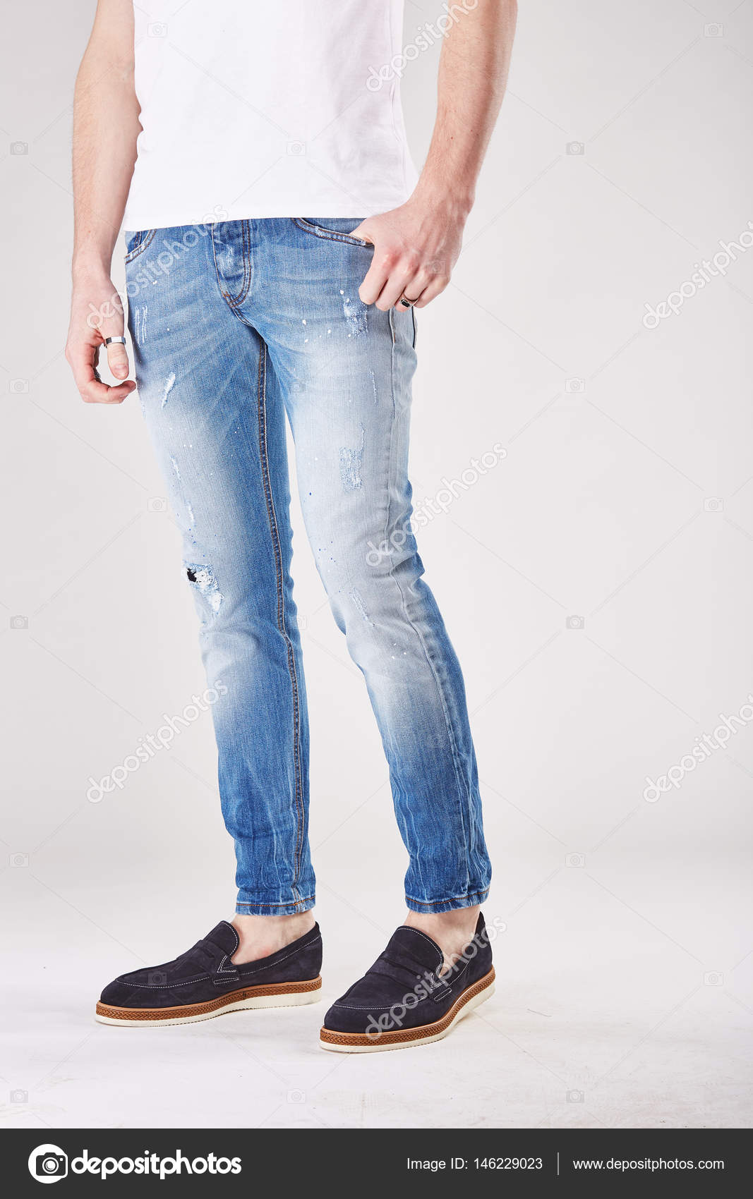 light studio in trendy light blue jeans 