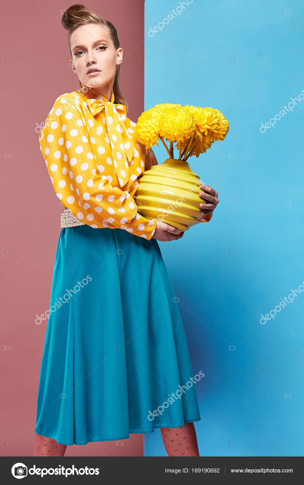 yellow and white polka dot blouse