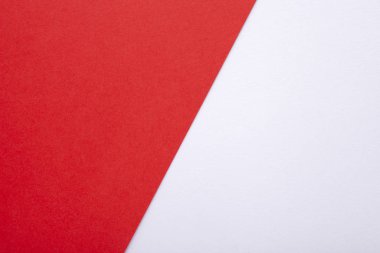 Arka plan olarak kırmızı ve beyaz pastel kağıt dokusu. Üst görünüm