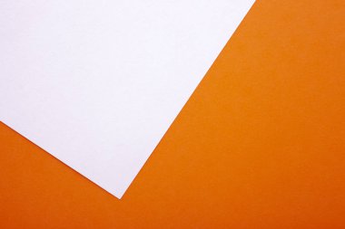 Arka plan olarak turuncu ve beyaz pastel kağıt dokusu. Üst görünüm