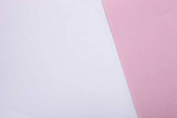 Arka plan olarak pembe ve beyaz pastel kağıt dokusu. Üst görünüm