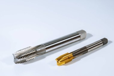 Metal iplik için dokunun. Metal işleme aracı.