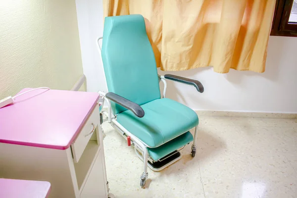 Chair of a hospital room to accompany patients while they are ho