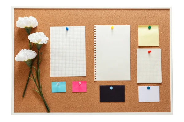 Bulletin board with note paper
