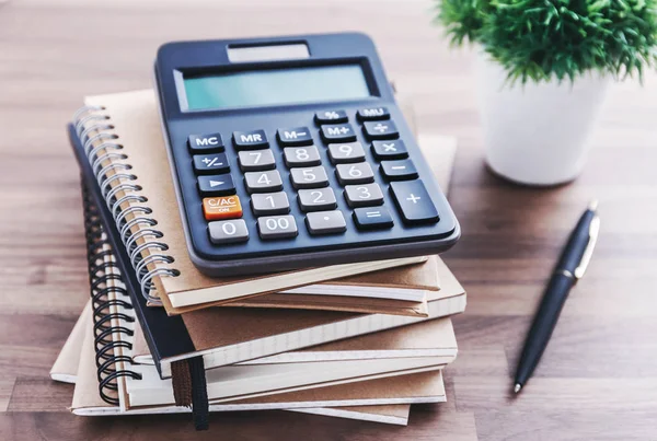 Calculator on office desk — Stock Photo, Image