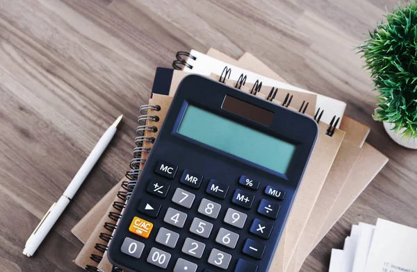 Calculator on office desk background — Stock Photo, Image