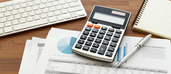 Financial accounting with calculator — Stock Photo, Image