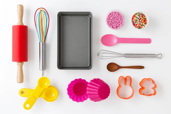 Baking utensils and tools on white
