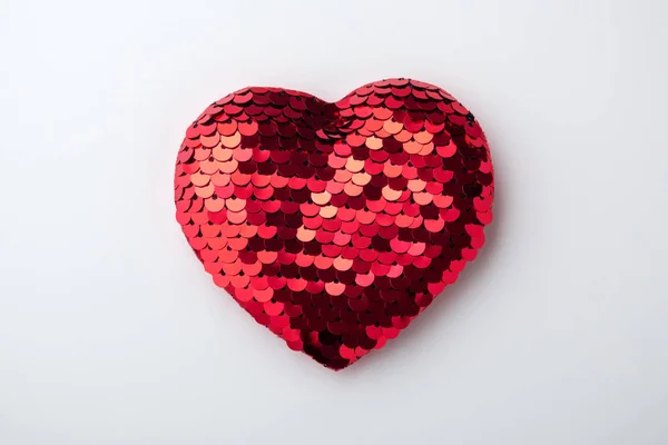 Red glitter heart on grey background — Stock Photo, Image