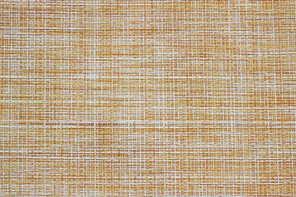 Embossed vinyl brown texture. Brown abstract fabric texture background, wallpaper or linen art. Raster modern geometric abstract background in yellow, white and brown colors