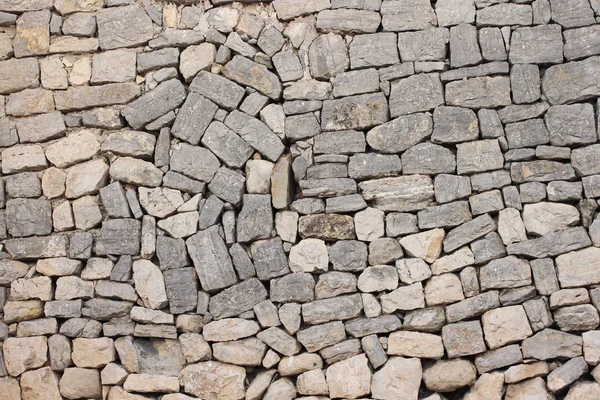 Foto einer Mauer aus grauen Ziegeln. — Stockfoto