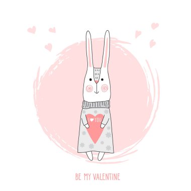 Sevimli tavşan. Bir kalp tutan karikatür tavşan ile Sevgililer günü kartı.