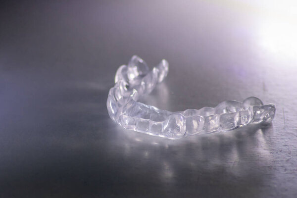 Dental splint against bruxism and grinding teeth with teeth imprint and dental healthcare of an orthodontist as dental protection in a medical dentistry is important to keep the teeth healthy