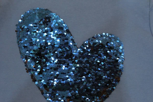 heart of blue and black sequins