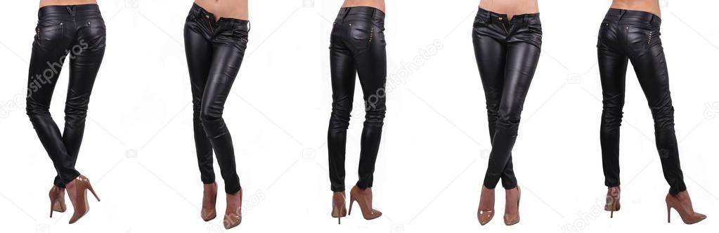  female set legs in black trousers on white background