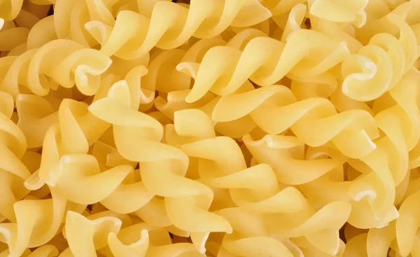 Raw pasta background close up, macro, meal — Stock Photo, Image