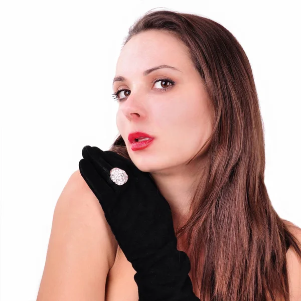 Young girl in a black glove with diamond ring on an white backgr — Stock Photo, Image