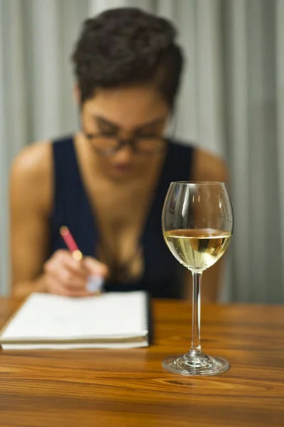 Woman with book and wine 스톡 사진