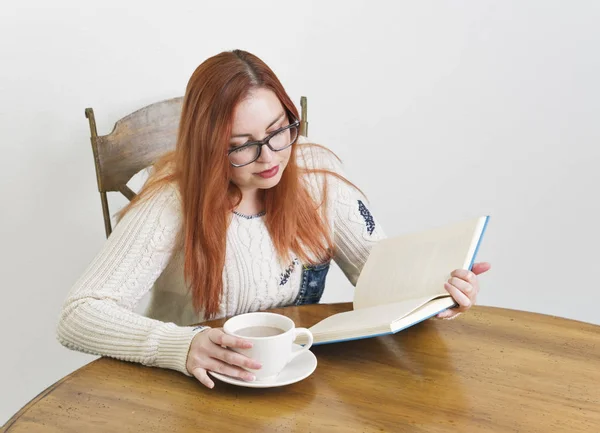 Redhead reading — 스톡 사진